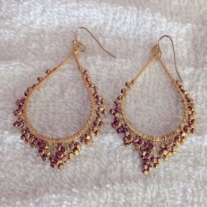 Gold tone dangling wire earrings